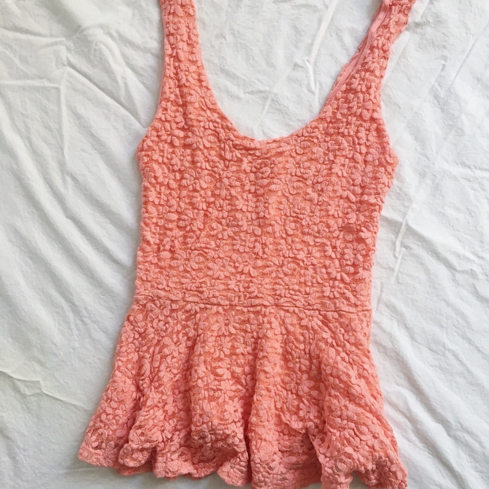 Lace peplum style top